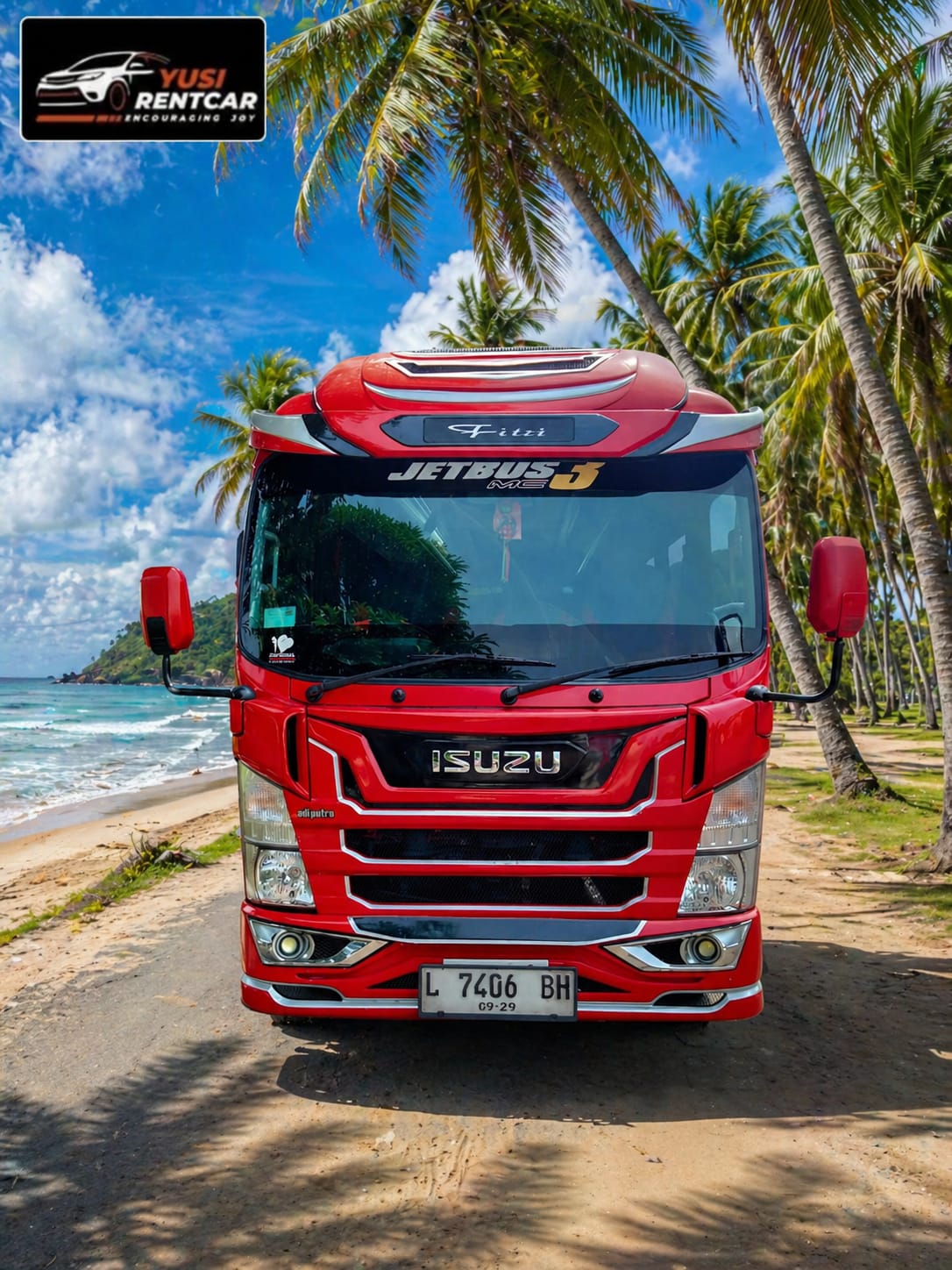 Bus JetBus MC merah di pantai
